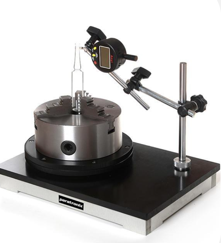 glass bottle verticality tester measuring axis deviation on a rotating chuck