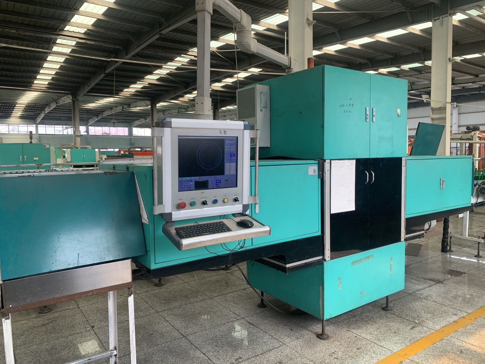 glass bottle quality control - optical automatic inspection machine on the cold end line